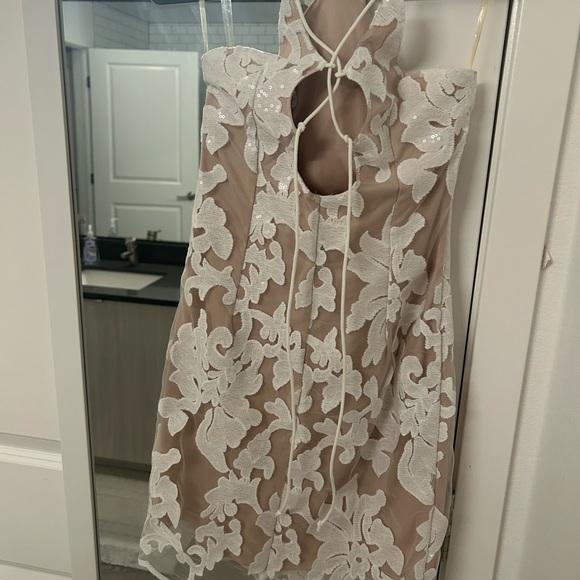 L'ATISTE White Lace Overlay Mini Dress with Nude Lining - Picture 9 of 16